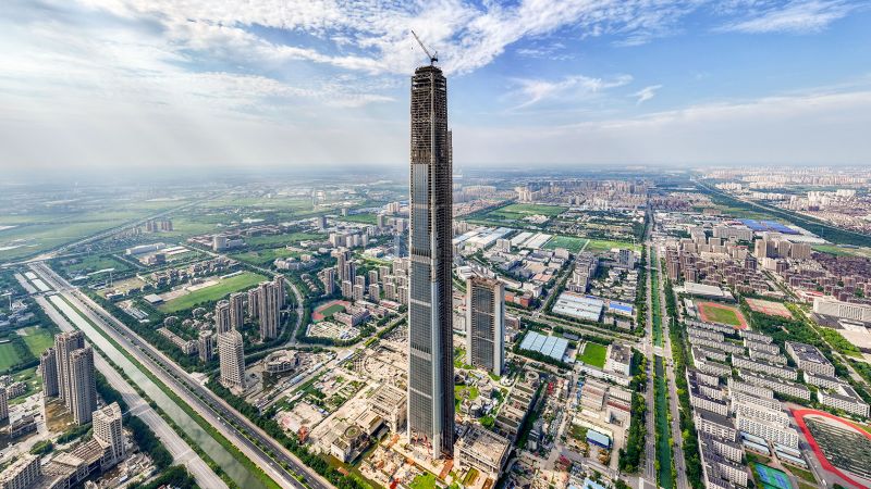 Goldin Finance 117: Construction of world’s tallest abandoned skyscraper to resume in China after a decade | CNN