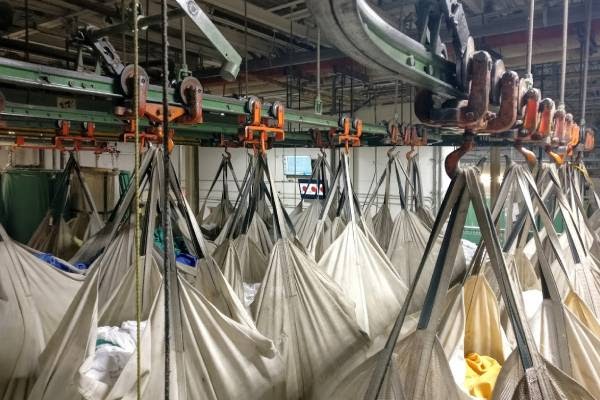 Transforming Workflow Efficiency: Inspiring Overhead Conveyor Case Studies by Alpha Conveyor