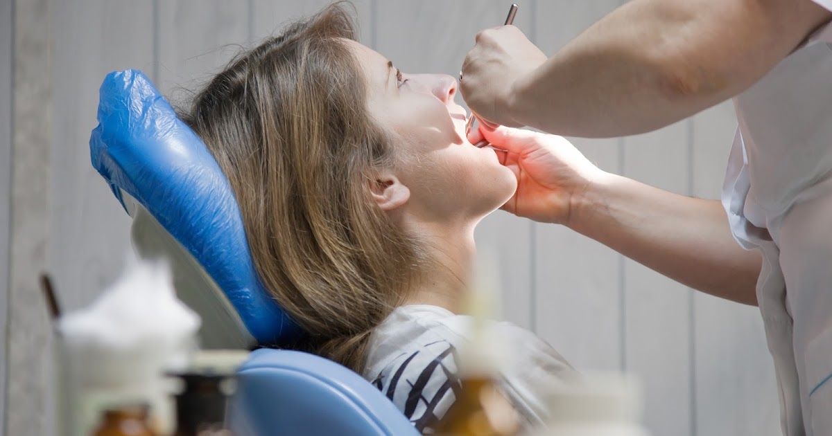 Improve Your Oral Health with Cosmetic Bridges and Tooth Extractions