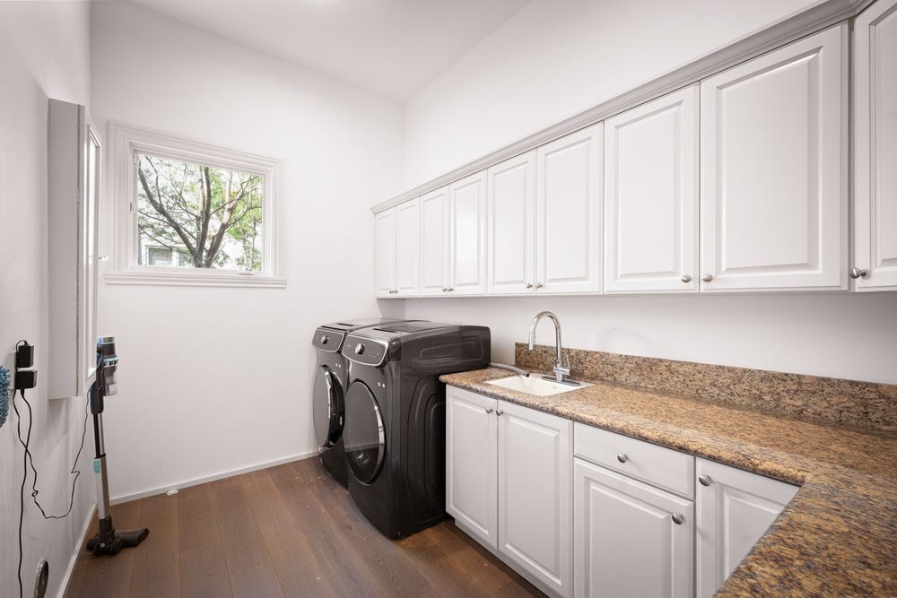 Why Deep Overhead Cupboards Create Dead Space in Laundry Storage Solutions