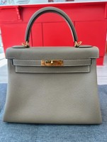 Nadine Collections Showcases the Elegant Kelly 28 Bag in Togo Leather Etoupe for Luxury Handbag Enthusiasts